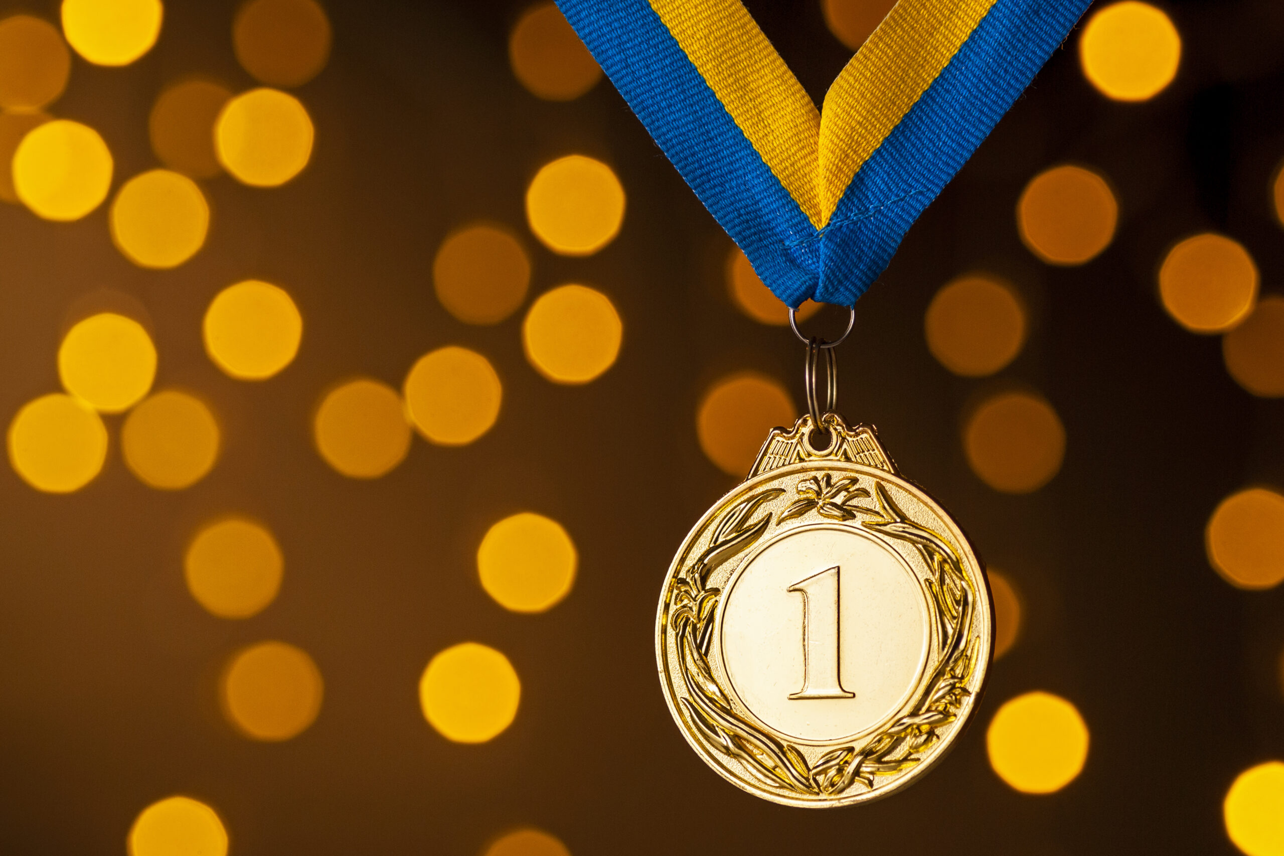 Gold champion or winners medallion on a ribbon